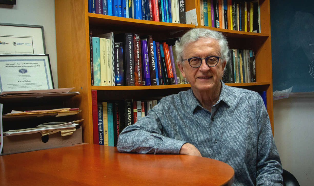 Ralph Pudritz sits in his office.